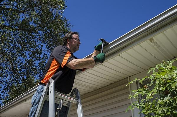 some signs that your gutters need repair include visible cracks, peeling paint, and water pooling around your foundation